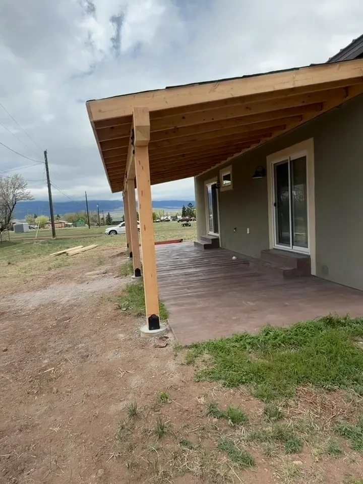 Foundation concrete work and wooden framing structure during custom home construction